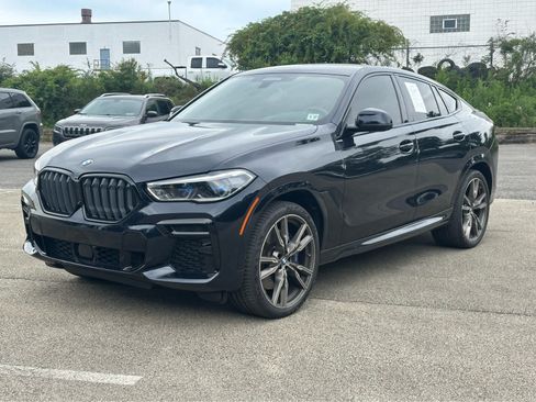 Used 2022 BMW X6 M50i w/ Executive Package AWD/4WD image 1