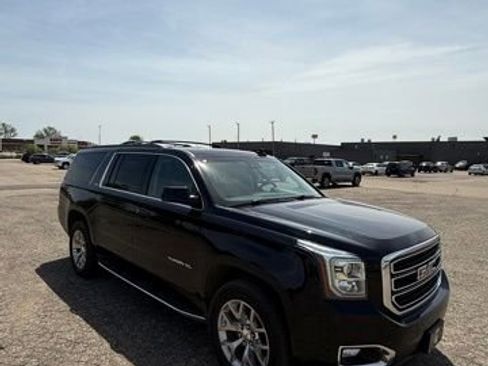 Used 2019 GMC Yukon XL SLT w/ Open Road Package AWD/4WD image 1