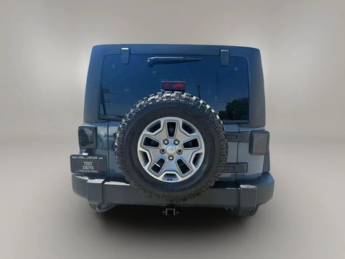 Used 2015 Jeep Wrangler Unlimited Rubicon w/ Dual Top Group AWD/4WD image 9