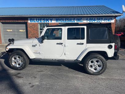 Used 2014 Jeep Wrangler Unlimited Sahara w/ Dual Top Group