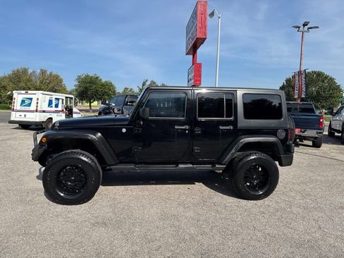 Used 2012 Jeep Wrangler Unlimited Sport AWD/4WD image 1