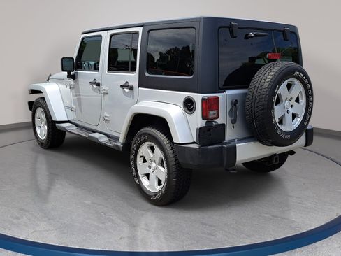 Used 2012 Jeep Wrangler Unlimited Sahara w/ Dual Top Group AWD/4WD image 7