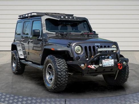 Used 2014 Jeep Wrangler Unlimited Sahara w/ Connectivity Group AWD/4WD image 1