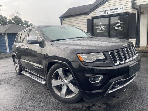 Used 2014 Jeep Grand Cherokee Overland w/ Advanced Technology Group AWD/4WD image 1