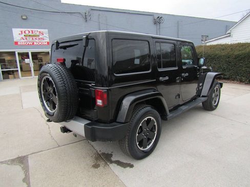 Used 2013 Jeep Wrangler Unlimited Sahara w/ Dual Top Group image 8
