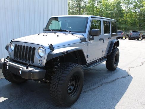 Used 2015 Jeep Wrangler Unlimited Sahara w/ Dual Top Group image 1