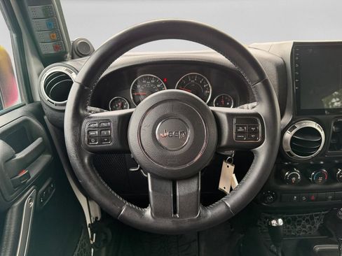 Used 2012 Jeep Wrangler Unlimited Sahara w/ Dual Top Group AWD/4WD image 19