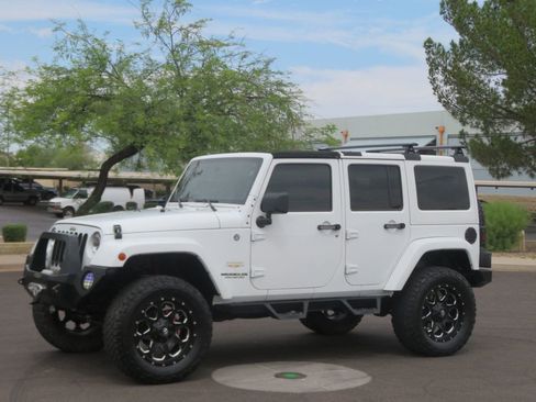 Used 2014 Jeep Wrangler Unlimited Sahara w/ Max Tow Package AWD/4WD image 1