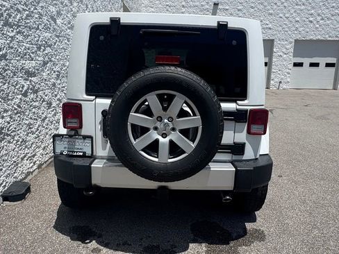 Used 2014 Jeep Wrangler Unlimited Sahara w/ Mopar Chrome Edition Group AWD/4WD image 4