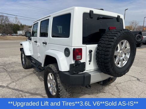 Used 2013 Jeep Wrangler Unlimited Sahara w/ Dual Top Group AWD/4WD image 33