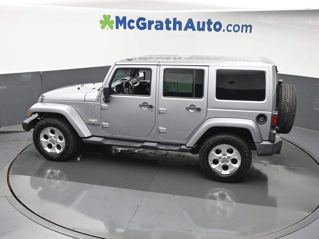 Used 2014 Jeep Wrangler Unlimited Sahara w/ Connectivity Group AWD/4WD image 24