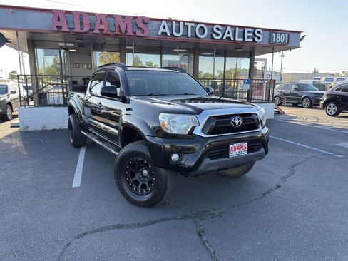 Used 2012 Toyota Tacoma 4x4 Double Cab w/ SR5 Pkg image 1