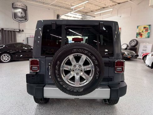Used 2015 Jeep Wrangler Unlimited Sahara w/ Dual Top Group AWD/4WD image 4