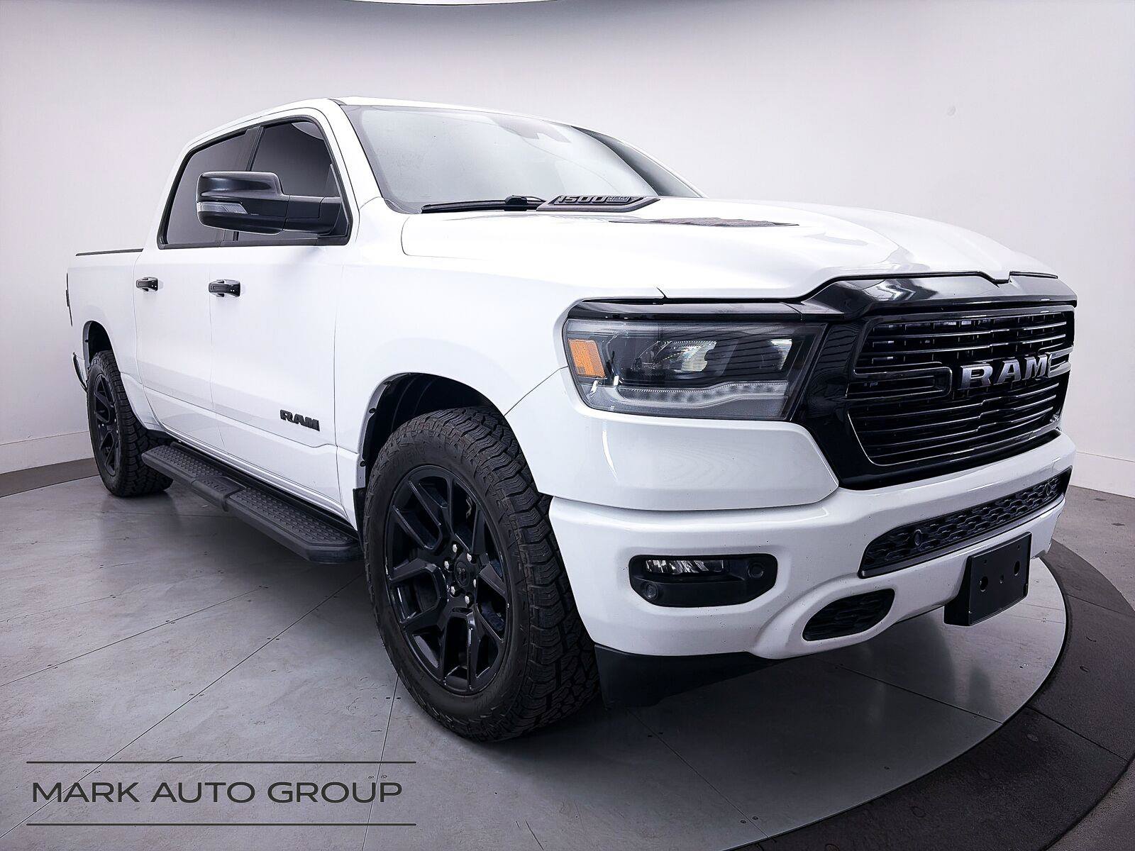 Used 2023 RAM 1500 Laramie AWD/4WD image 1