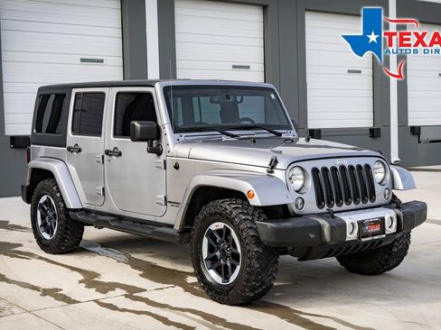 Used 2015 Jeep Wrangler Unlimited Sahara w/ Dual Top Group image 1