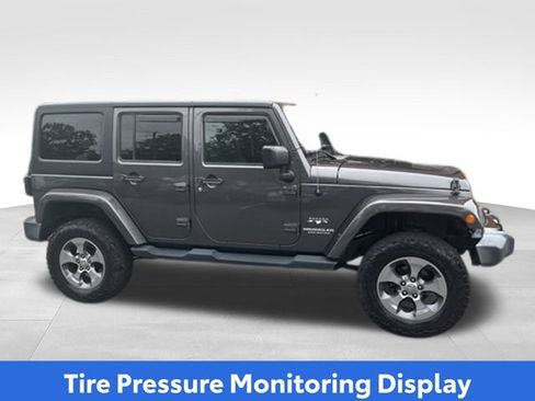 Used 2016 Jeep Wrangler Unlimited Sahara w/ Dual Top Group AWD/4WD image 22