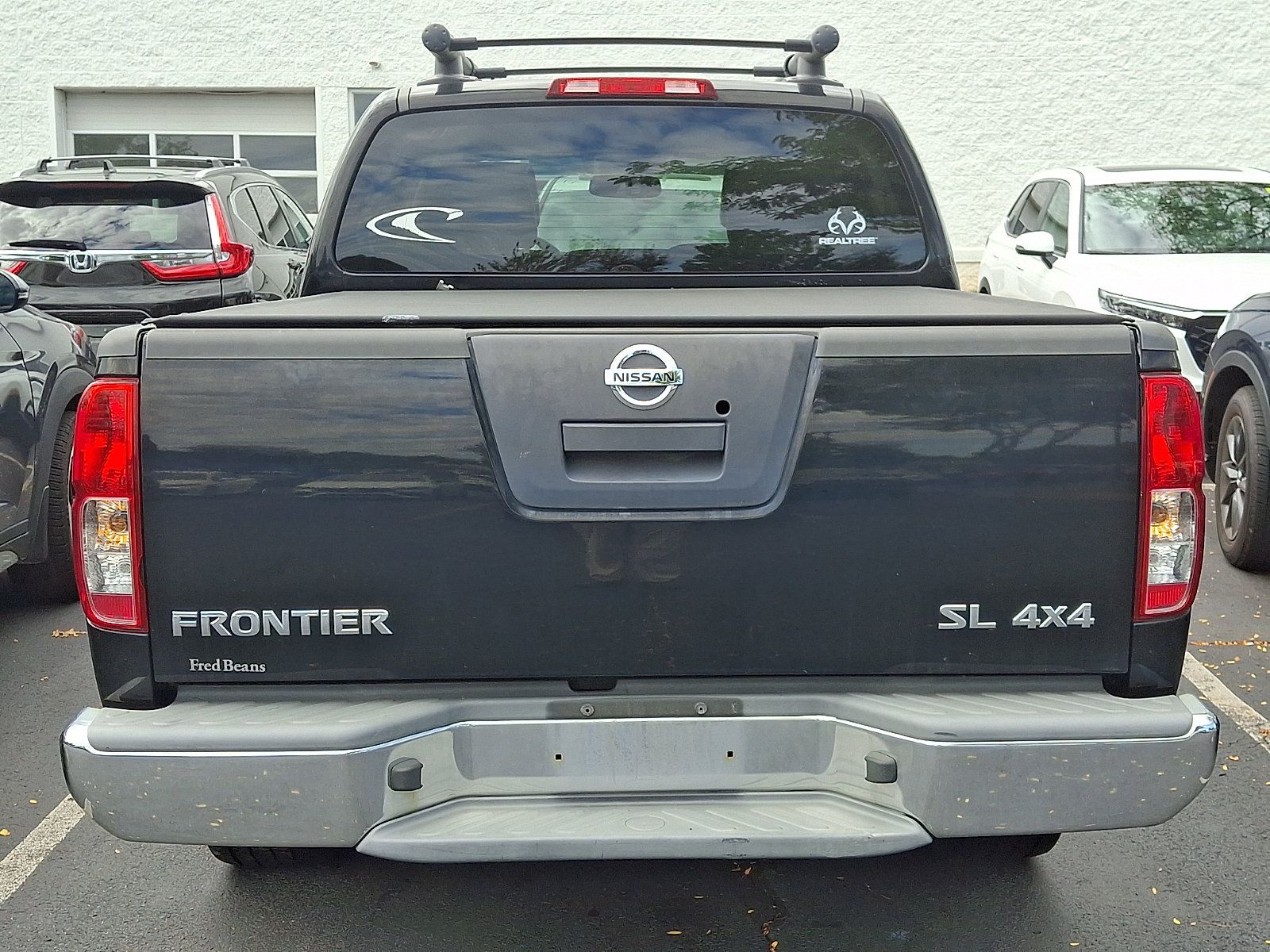Used 2011 Nissan Frontier SL AWD/4WD image 4