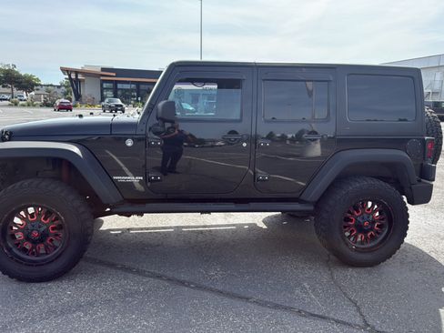 Used 2012 Jeep Wrangler Unlimited Sport w/ Black Appearance Group AWD/4WD image 15