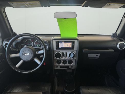 Used 2009 Jeep Wrangler Unlimited Sahara w/ Mopar Leather Group AWD/4WD image 13