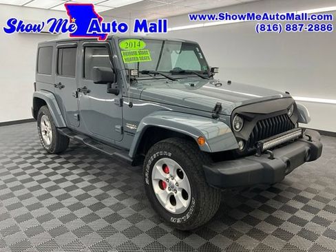 Used 2014 Jeep Wrangler Unlimited Sahara w/ Dual Top Group AWD/4WD image 1