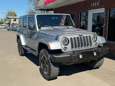 Used 2014 Jeep Wrangler Unlimited Sahara AWD/4WD image 1