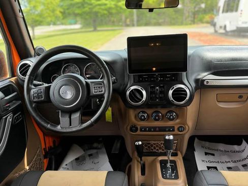Used 2012 Jeep Wrangler Unlimited Sahara w/ Dual Top Group AWD/4WD image 7