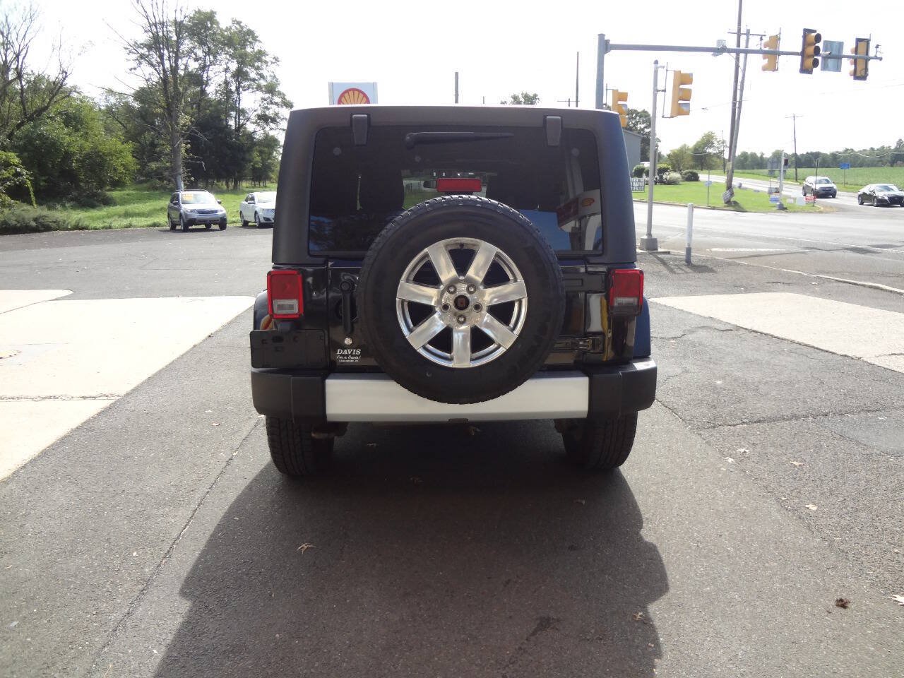 Used 2012 Jeep Wrangler Unlimited Sahara w/ Dual Top Group AWD/4WD image 4