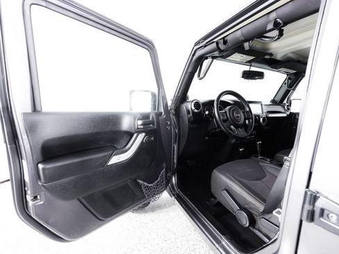Used 2014 Jeep Wrangler Unlimited Rubicon w/ Dual Top Group AWD/4WD image 20