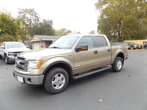 Used 2013 Ford F150 XLT w/ Mid Equipment Group AWD/4WD image 1