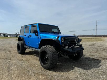 Used 2015 Jeep Wrangler Unlimited Sahara w/ Dual Top Group