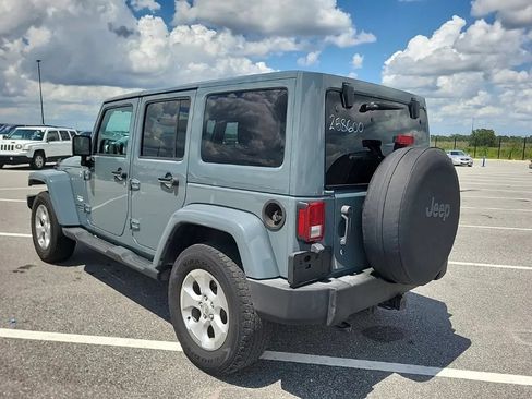 Used 2014 Jeep Wrangler Unlimited Sahara w/ Connectivity Group AWD/4WD image 3