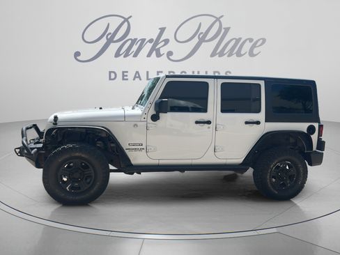 Used 2011 Jeep Wrangler Unlimited Sport w/ Connectivity Group AWD/4WD image 2
