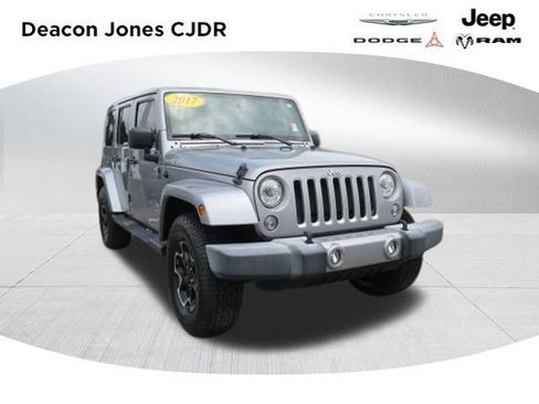 Used 2017 Jeep Wrangler Unlimited Sahara w/ Dual Top Group AWD/4WD image 1