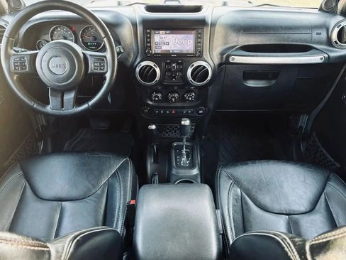 Used 2014 Jeep Wrangler Unlimited Sahara w/ Dual Top Group image 17