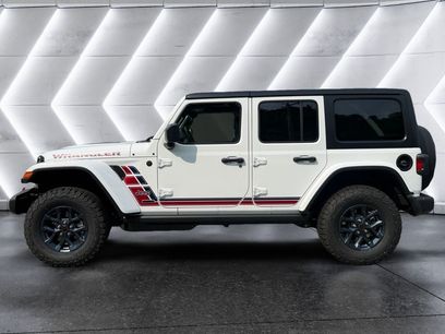 New 2026 Jeep Wrangler Unlimited Sport w/ Dual Top Group