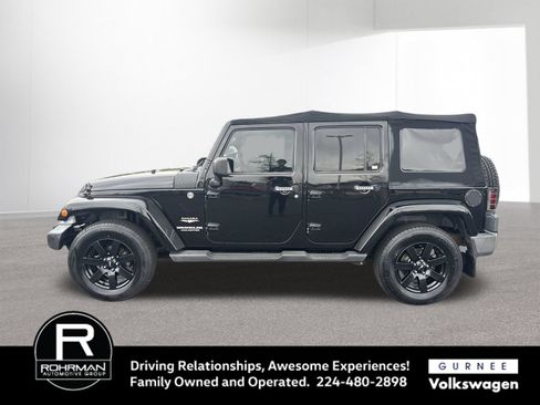 Used 2011 Jeep Wrangler Unlimited Sahara w/ Dual Top Group AWD/4WD image 6