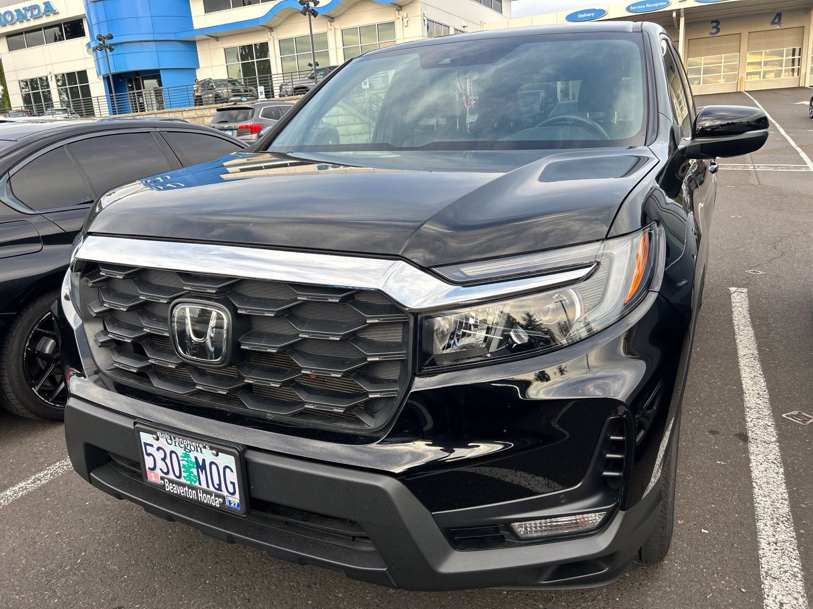 Used 2023 Honda Passport EX-L image 1