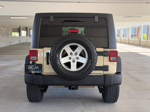 Used 2011 Jeep Wrangler Unlimited Rubicon w/ Dual Top Group AWD/4WD image 6