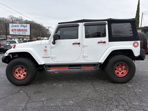 Used 2014 Jeep Wrangler Unlimited Sahara w/ Dual Top Group image 2