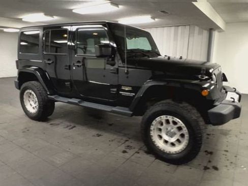 Used 2014 Jeep Wrangler Unlimited Sahara w/ Dual Top Group image 2