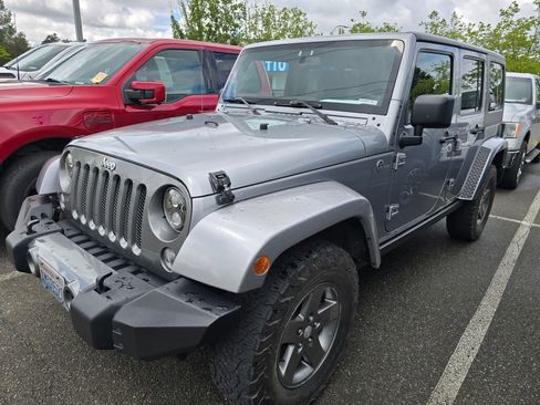 Used 2013 Jeep Wrangler Unlimited Sport AWD/4WD image 1