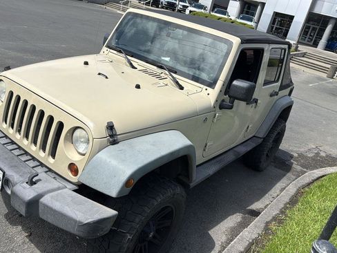 Used 2011 Jeep Wrangler Unlimited Sport AWD/4WD image 1