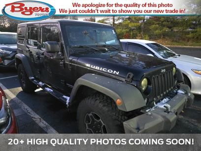 Used 2015 Jeep Wrangler Unlimited Rubicon w/ Dual Top Group