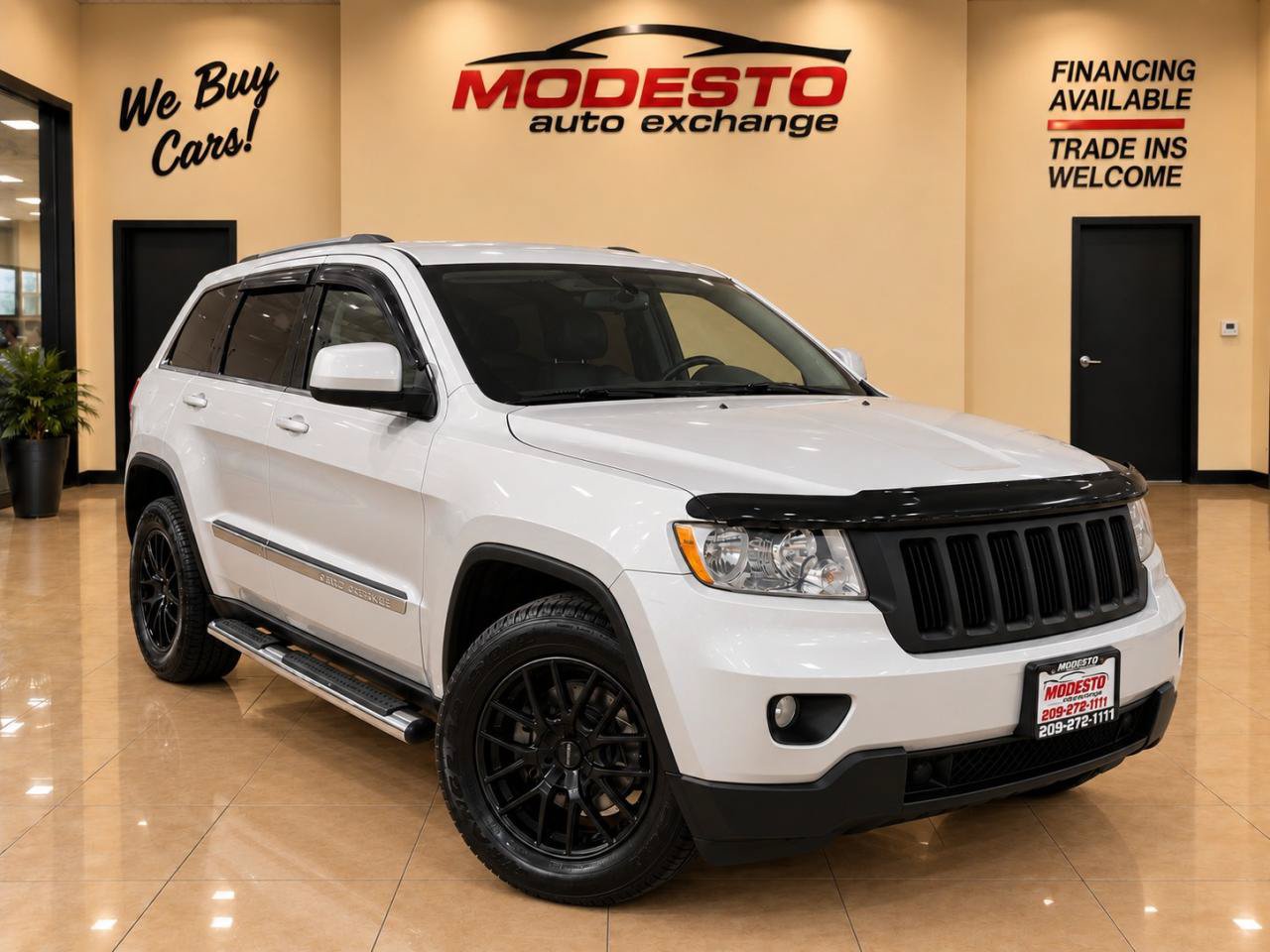 Used 2012 Jeep Grand Cherokee Laredo RWD image 1