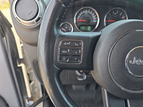 Used 2013 Jeep Wrangler Unlimited Sahara w/ Dual Top Group AWD/4WD image 15