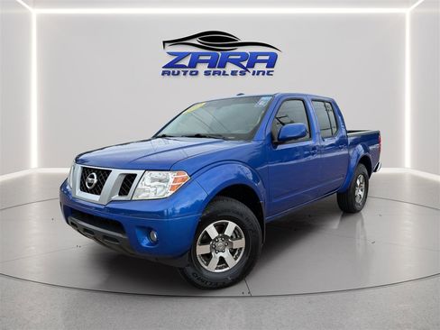 Used 2013 Nissan Frontier PRO-4X AWD/4WD image 1