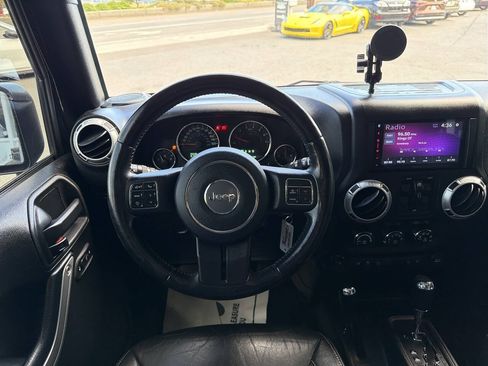 Used 2015 Jeep Wrangler Unlimited Rubicon w/ Dual Top Group AWD/4WD image 25