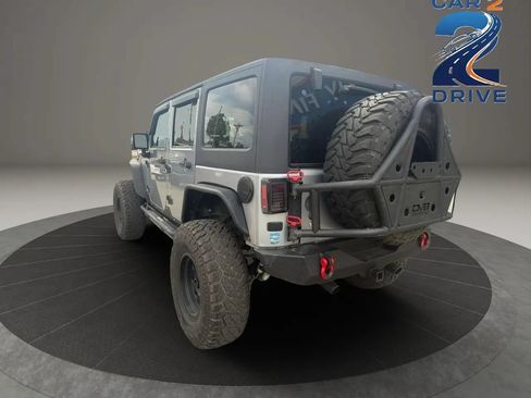 Used 2014 Jeep Wrangler Unlimited Sahara AWD/4WD image 8