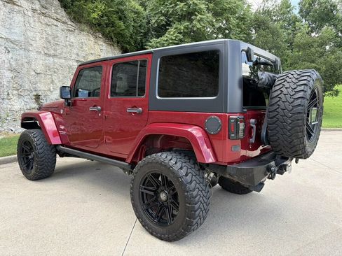Used 2013 Jeep Wrangler Unlimited Sahara w/ Dual Top Group AWD/4WD image 13