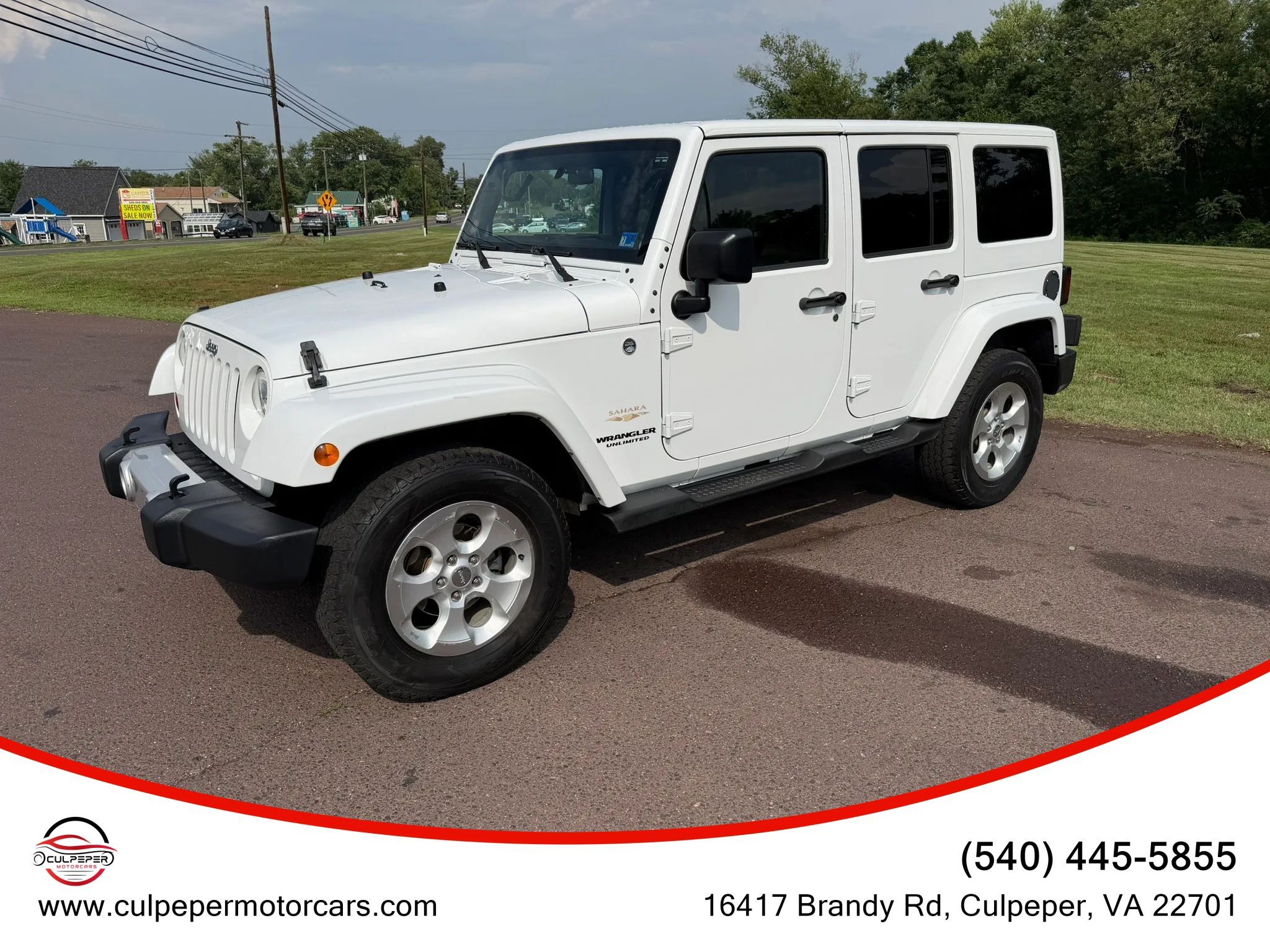 Used 2012 Jeep Wrangler Unlimited Sahara w/ Connectivity Group AWD/4WD image 2